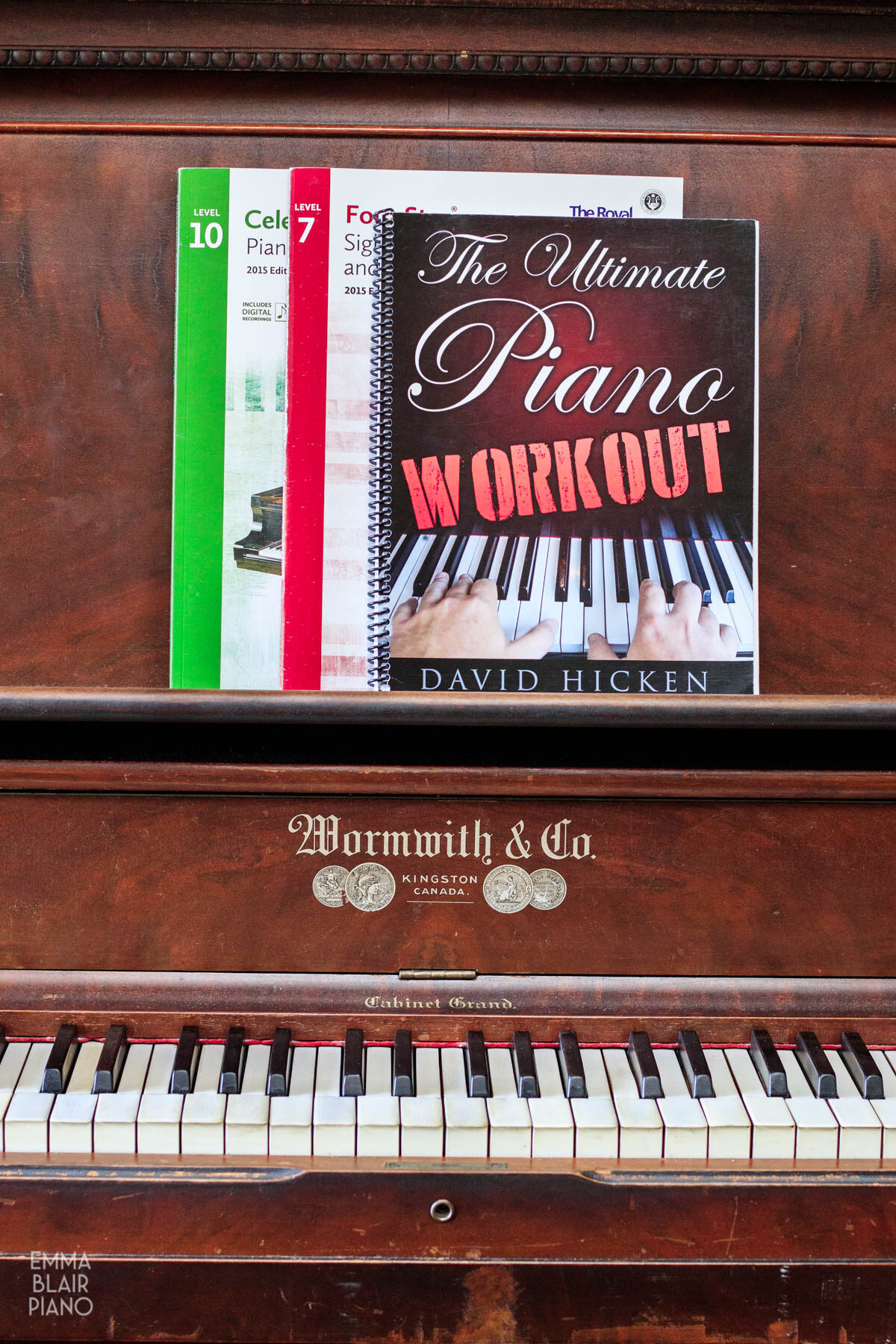 music books on the piano music stand