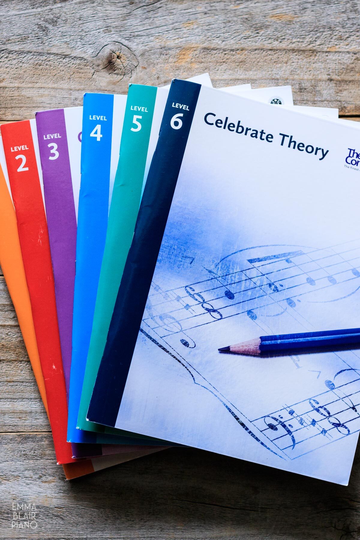 stack of music theory books from levels 1-6