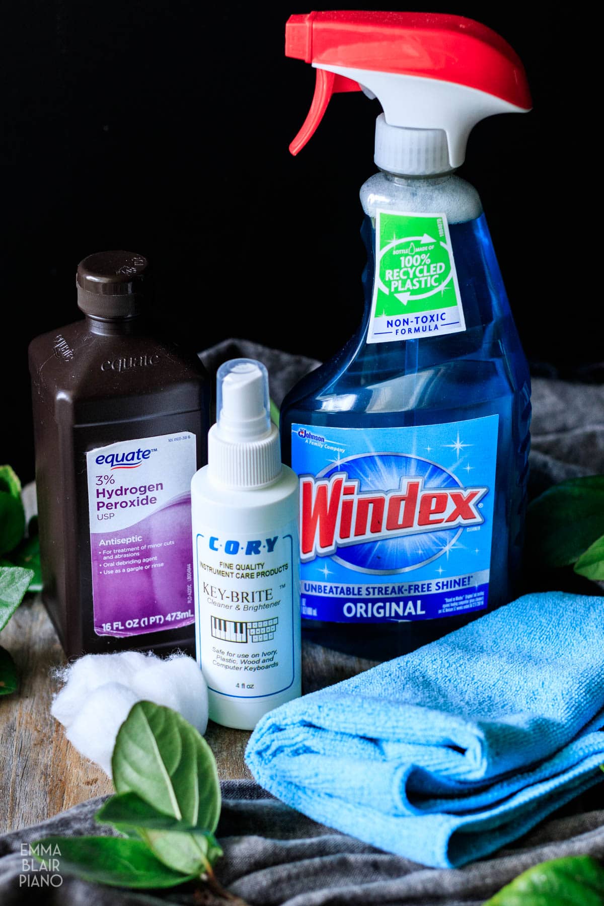 Windex, Cory Key-Brite, and hydrogen peroxide for cleaning piano keys